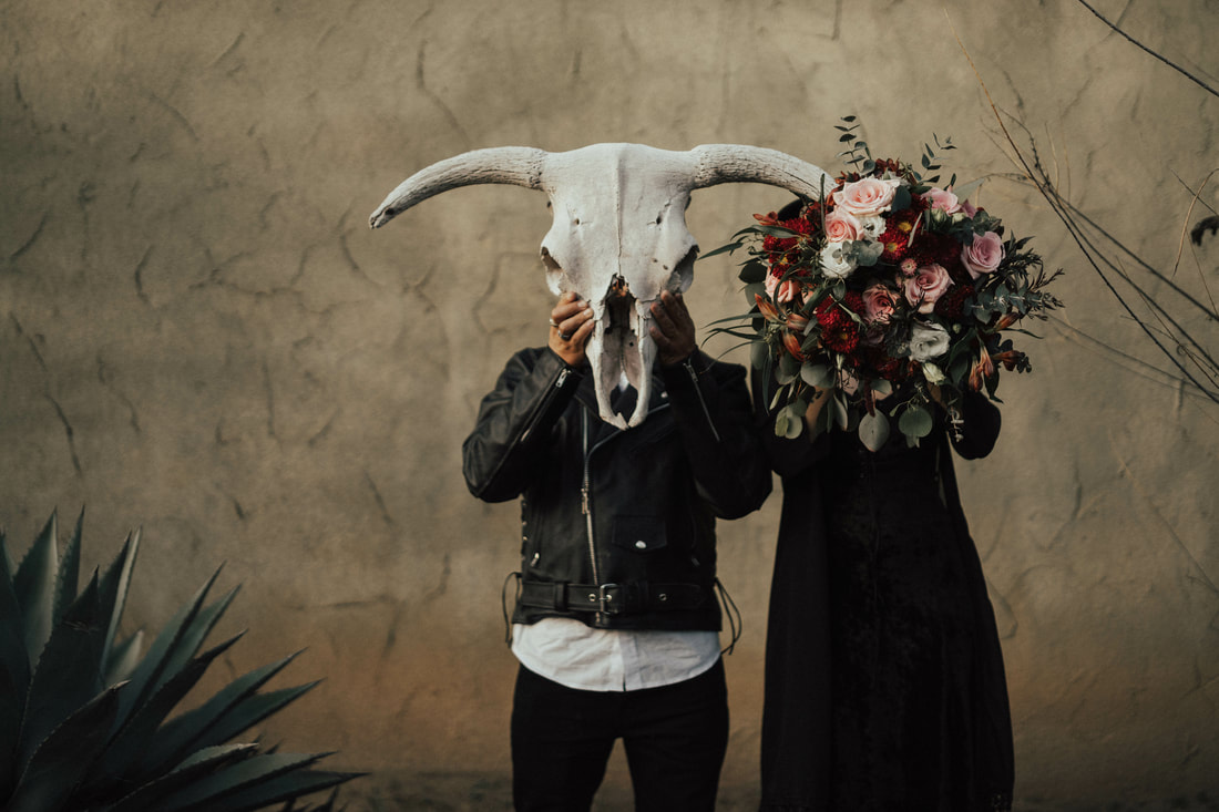 Creative Moody and Goth couple's session in Cactus garden in Fresno taken by Santa Cruz wedding and elopement photographer and videographer 