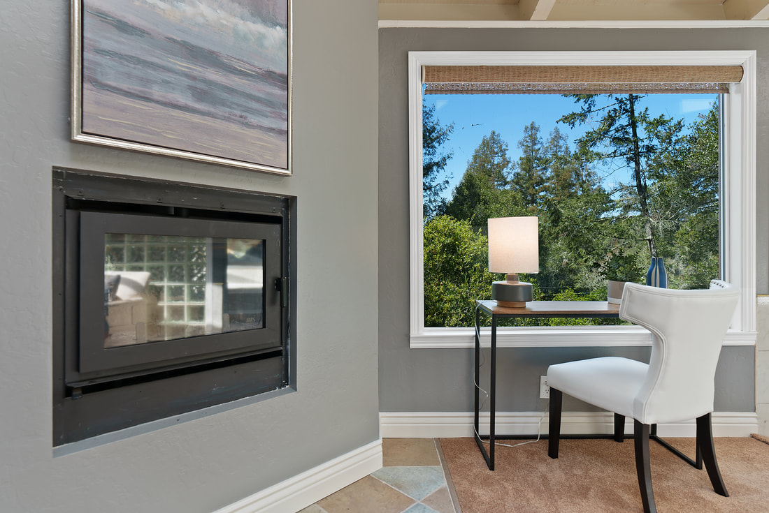 Fireplace and Desk Area overlooking redwood forest real estate listing photo