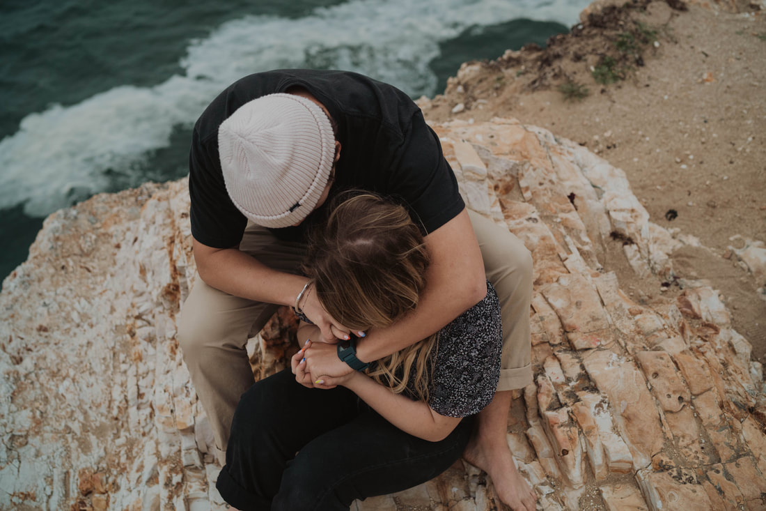 Shark Fin Cove engagement session with couple from Utah